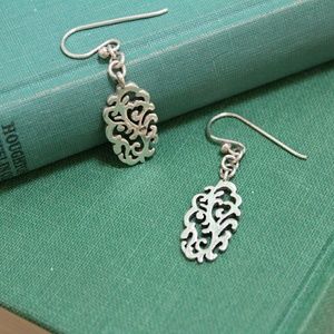 Barse sterling silver scrolled earrings.